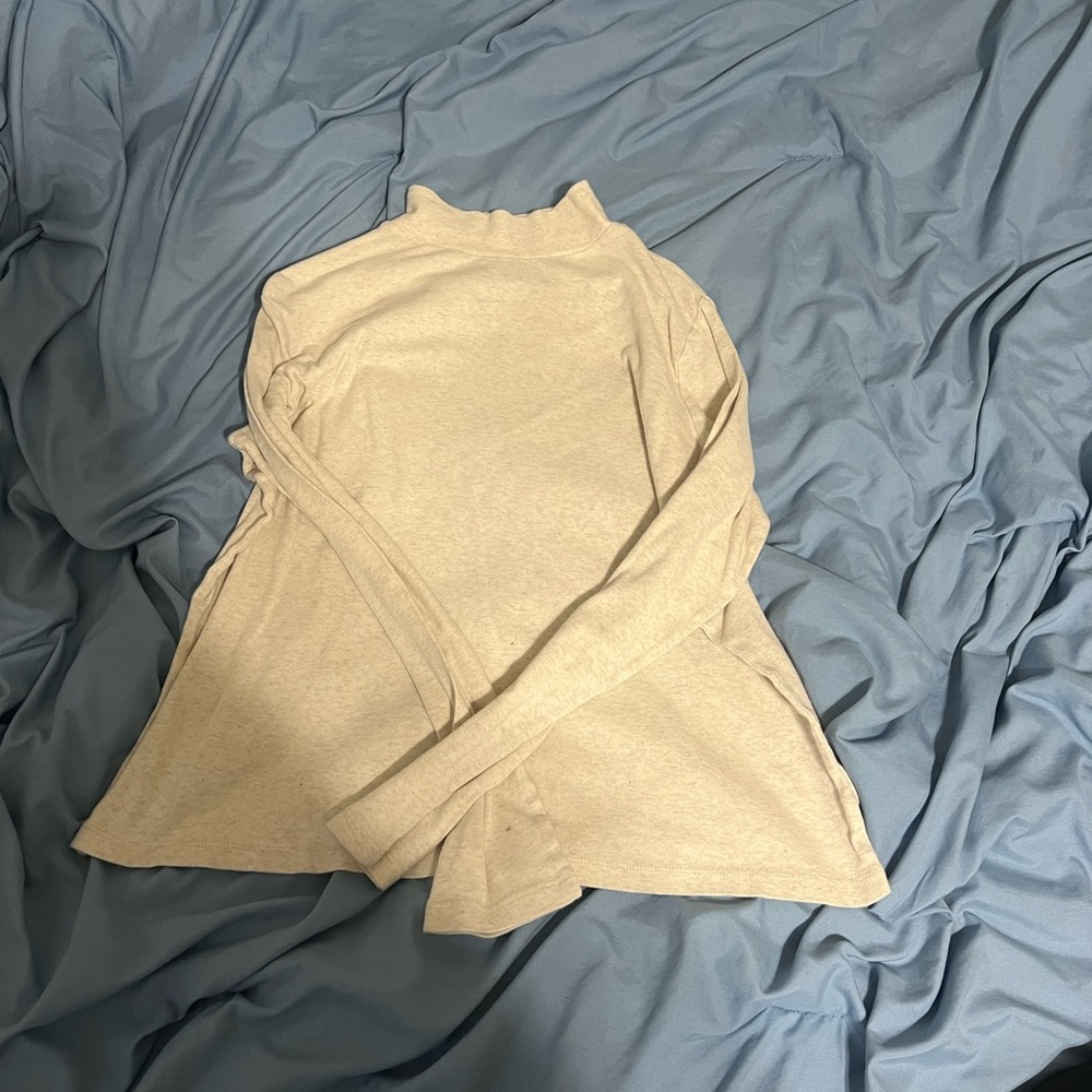 Kim Rogers Soft Cream Turtleneck Sweater